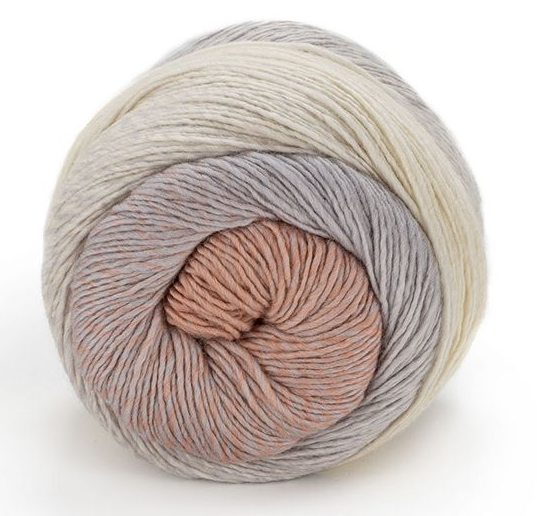 Laines du Nord Poema Cashmere 100 g yarn ball featuring soft gradient colors of cream, gray, and peach.